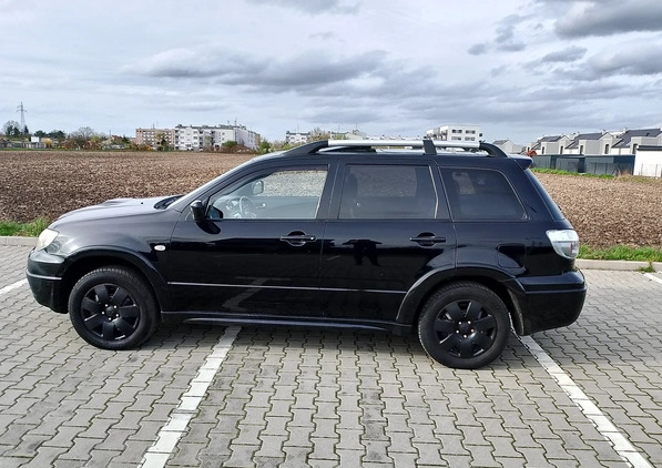 Mitsubishi Outlander cena 16500 przebieg: 283000, rok produkcji 2006 z Poznań małe 37